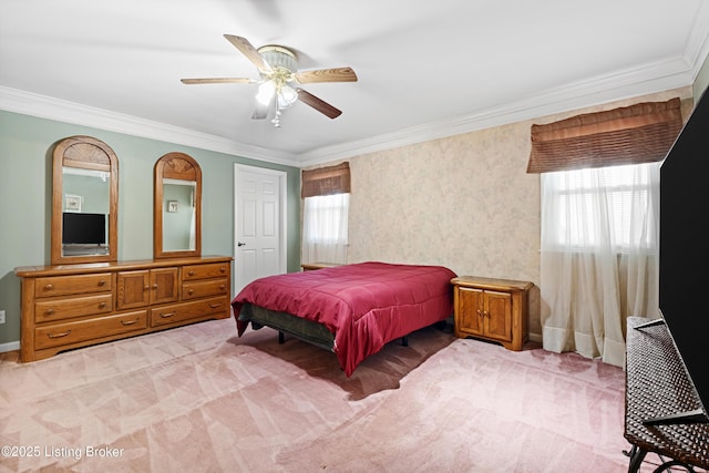 bedroom with crown molding, ceiling fan, and light colored carpet