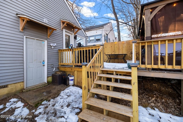 view of snow covered deck