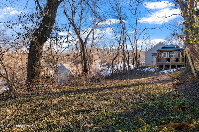 view of yard featuring a gazebo and a deck