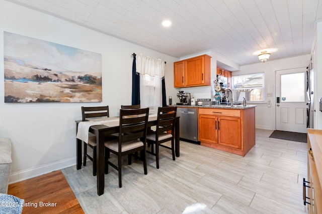 interior space with light hardwood / wood-style floors and sink