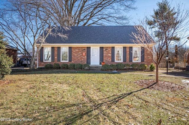 single story home with a front yard