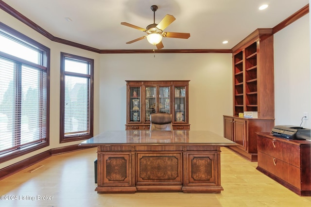 office area with crown molding, ceiling fan, and light hardwood / wood-style floors