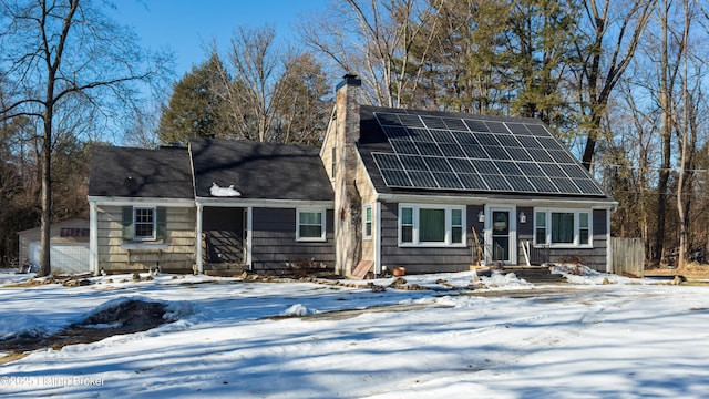 view of front of home with solar panels