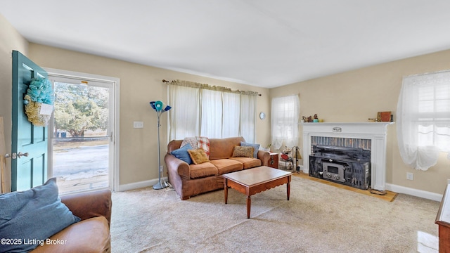 carpeted living room with plenty of natural light