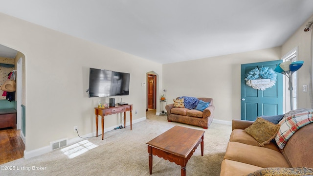 living room with light carpet