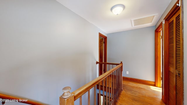 hall with light wood-type flooring