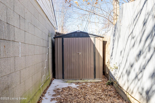 view of gate with a storage unit