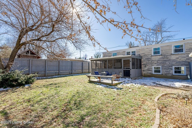 view of yard with a sunroom