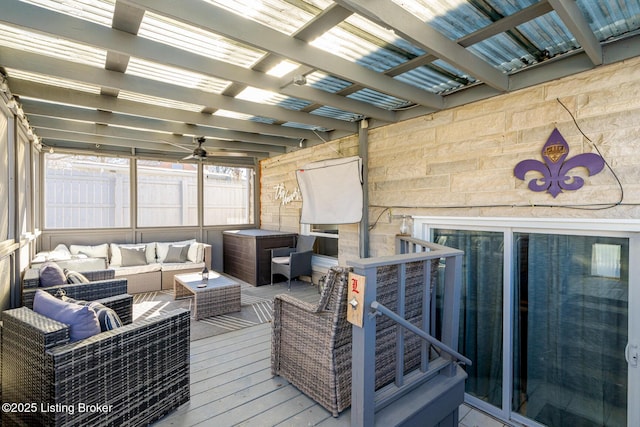 wooden terrace featuring an outdoor living space, a pergola, and ceiling fan