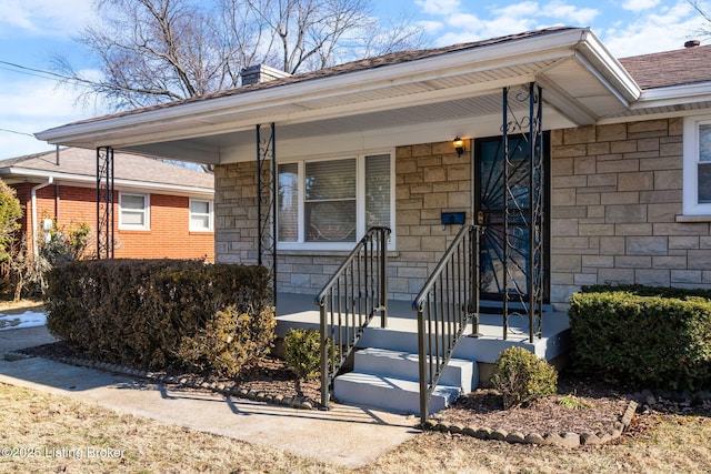 property entrance with covered porch