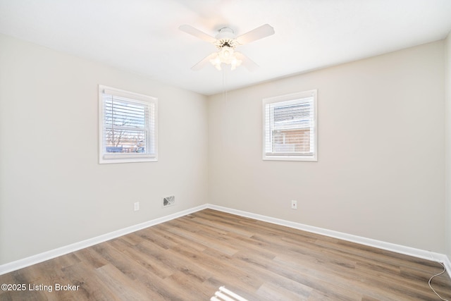 unfurnished room featuring wood-type flooring and ceiling fan