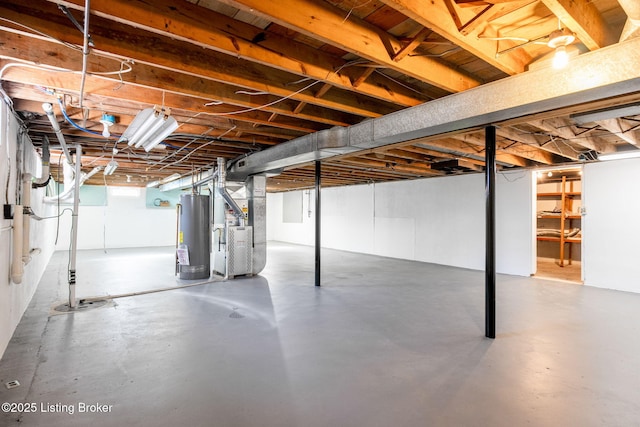 basement with heating unit and gas water heater