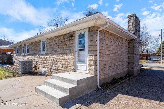 view of property exterior featuring central AC