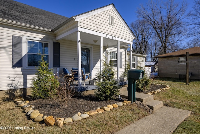 view of front of property featuring covered porch