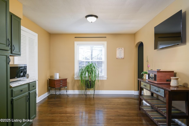 interior space with dark wood-type flooring