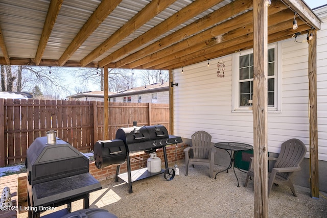 view of patio with a grill