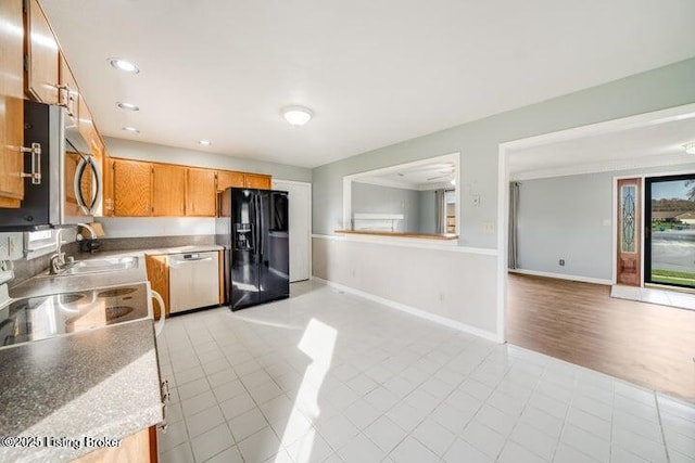 kitchen featuring light tile patterned floors and stainless steel appliances