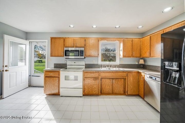 kitchen featuring stainless steel appliances and sink