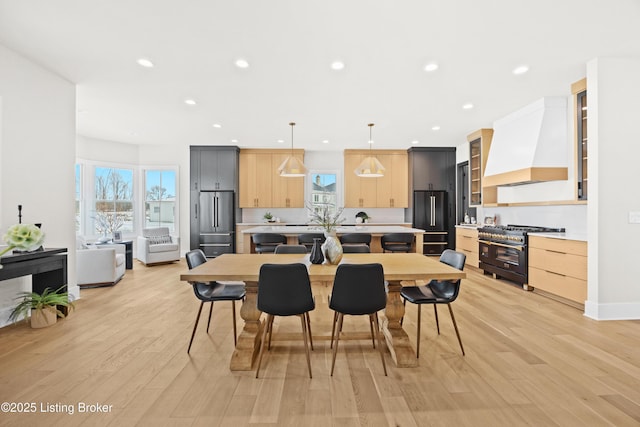 dining room with light wood-type flooring