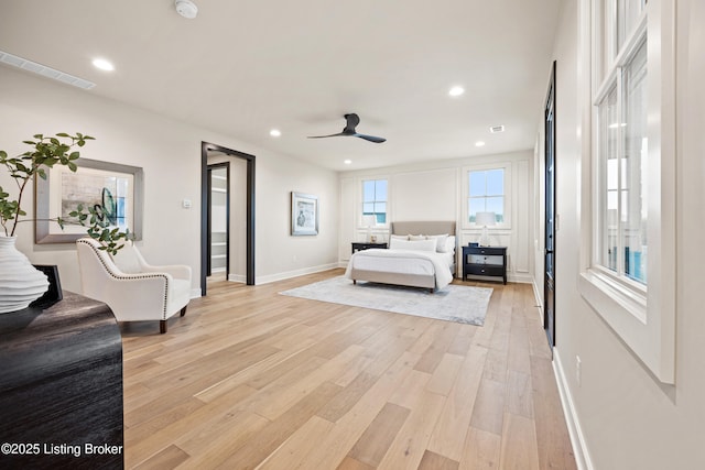 bedroom featuring ceiling fan and light wood-type flooring