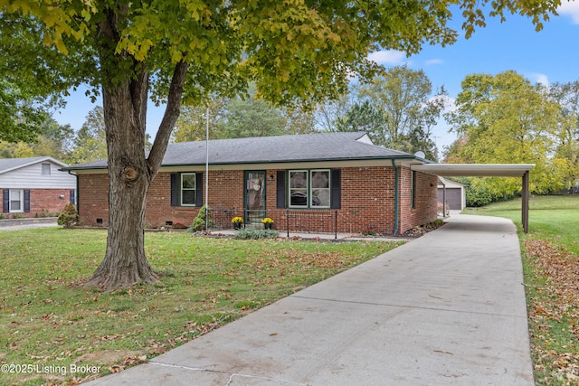 ranch-style home with a carport, a garage, and a front yard