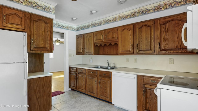 kitchen featuring light tile patterned flooring, sink, ornamental molding, ceiling fan, and white appliances