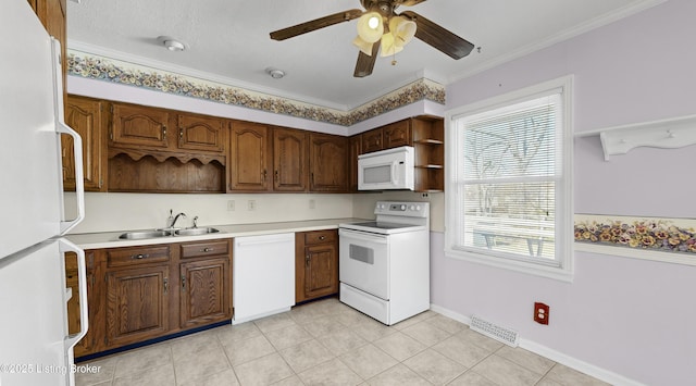 kitchen featuring sink, crown molding, white appliances, ceiling fan, and light tile patterned flooring