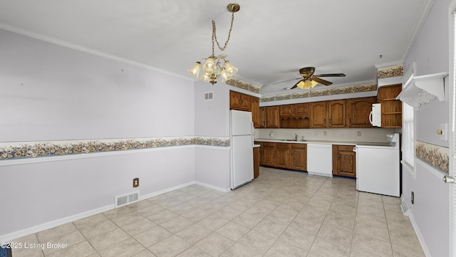 kitchen with ceiling fan with notable chandelier, pendant lighting, sink, ornamental molding, and white appliances