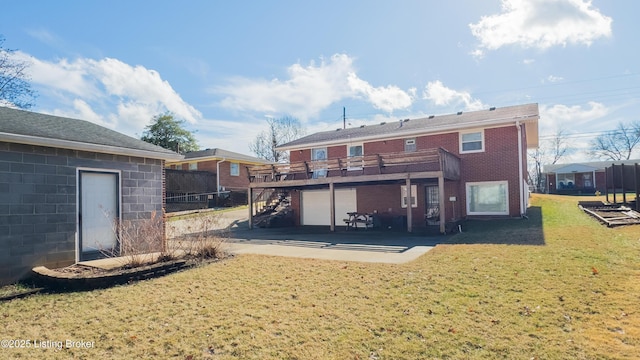 rear view of house with a patio area and a lawn