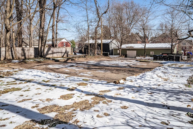 view of yard covered in snow