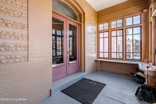 property entrance featuring french doors