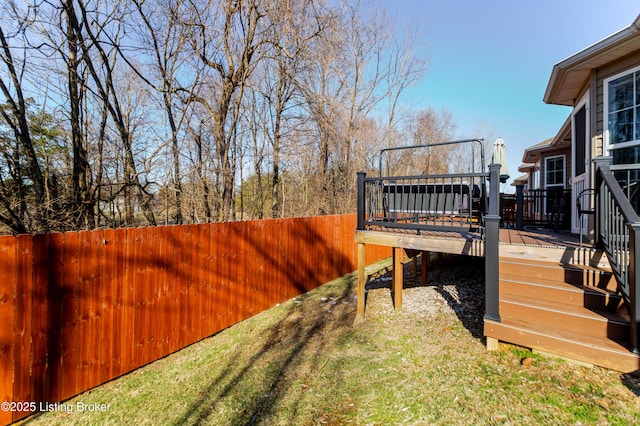 view of yard featuring a wooden deck