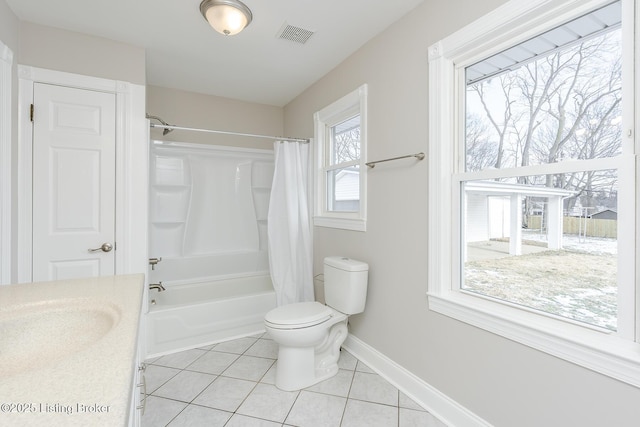 full bathroom featuring tile patterned floors, toilet, vanity, and shower / bath combo