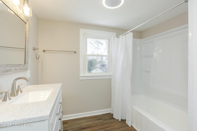 bathroom with vanity, shower / tub combo, and hardwood / wood-style flooring