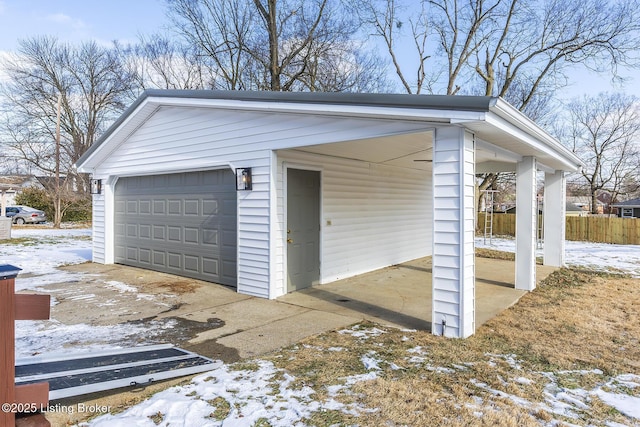 view of snow covered garage