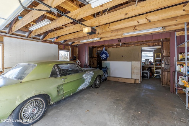 garage featuring a garage door opener