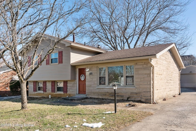 split level home featuring a garage