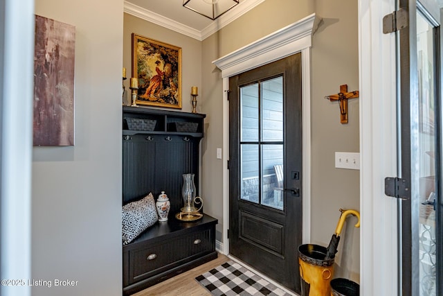 mudroom featuring crown molding and wood-type flooring