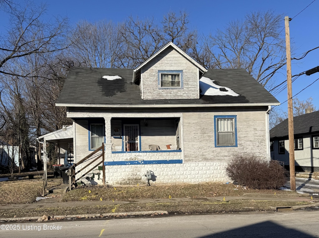 view of front of home featuring covered porch