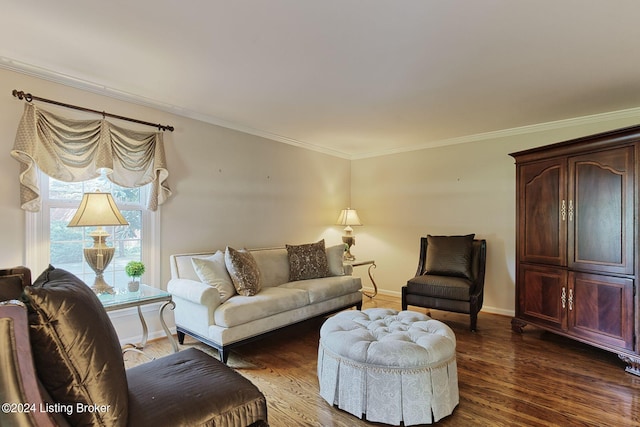 living room with dark hardwood / wood-style flooring and ornamental molding