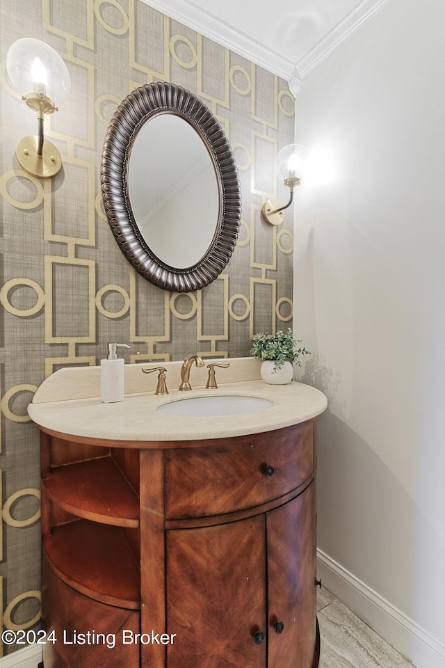 bathroom with vanity and crown molding