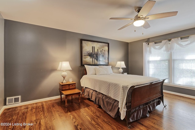 bedroom featuring hardwood / wood-style flooring and ceiling fan