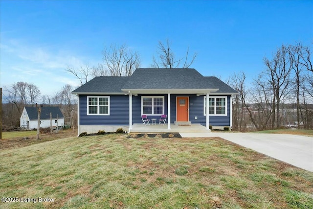 view of front of property with a porch and a front yard