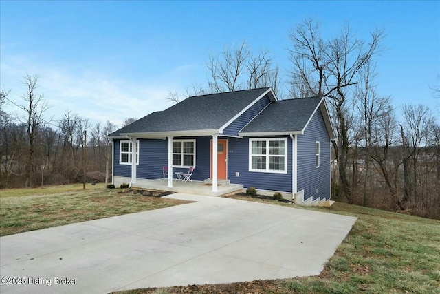 view of front facade with a porch and a front yard