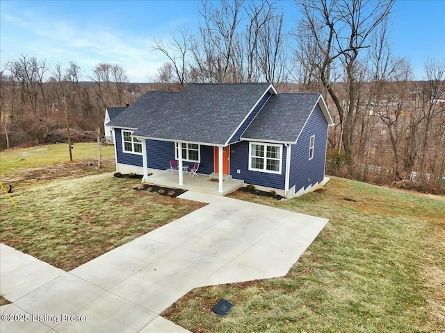 view of front of home featuring a front yard and covered porch