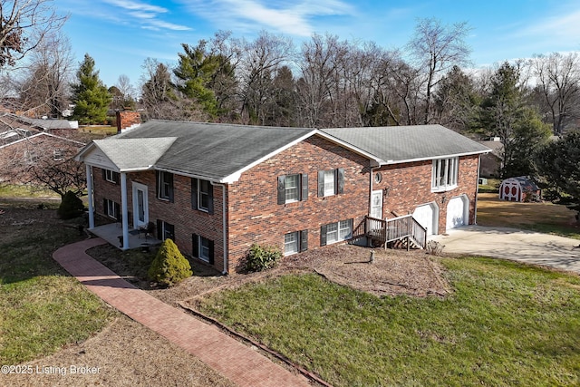 view of front of property with a garage and a front yard