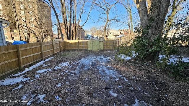 view of yard layered in snow