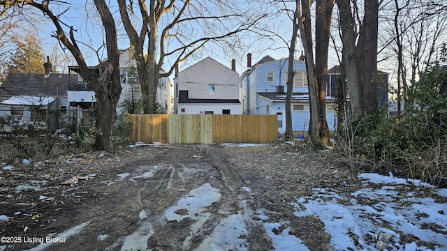 view of yard layered in snow