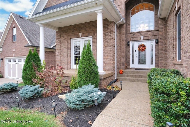 property entrance with a garage