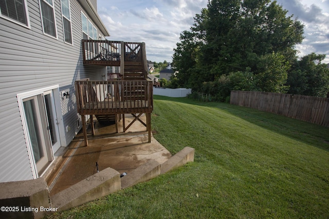 view of yard featuring a deck